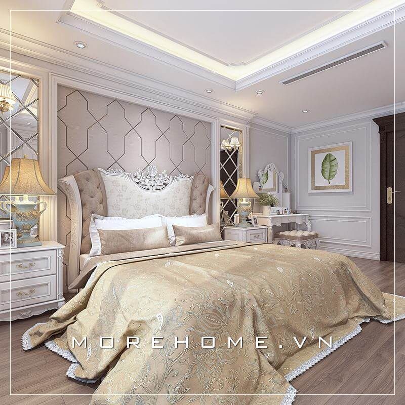 Giường ngủ chung cư cao cấp phong cách tân cổ điển được gia chủ lựa chọn, đầu giường được thiết kế cách điệu kết hợp bọc nỉ tạo điểm nhấn thu hút và sang trọng hơn